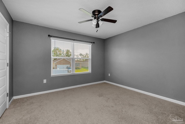 5457 Merlin Way, Milton, FL 32583 - unfurnished room with light colored carpet, a ceiling fan, and baseboards