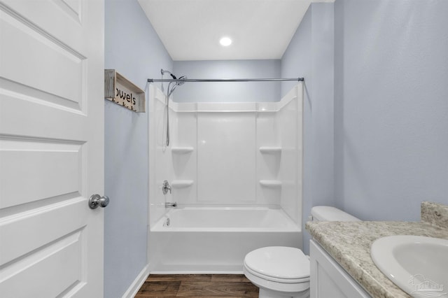 5457 Merlin Way, Milton, FL 32583 - bathroom featuring wood finished floors, vanity, toilet,  shower combination, and baseboards