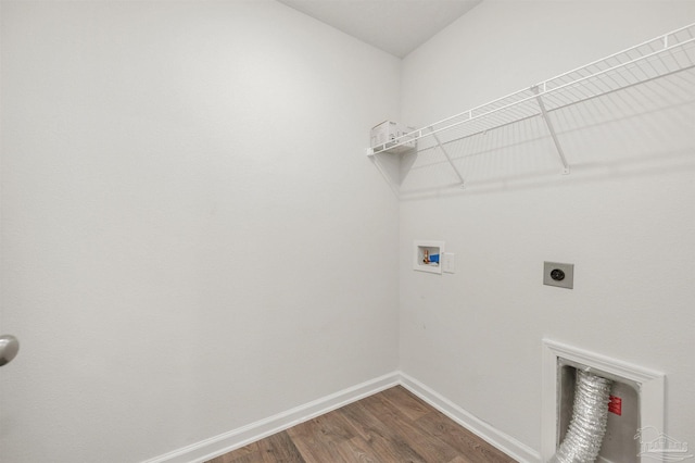 5457 Merlin Way, Milton, FL 32583 - laundry room featuring electric dryer hookup, washer hookup, dark wood-style floors, and baseboards