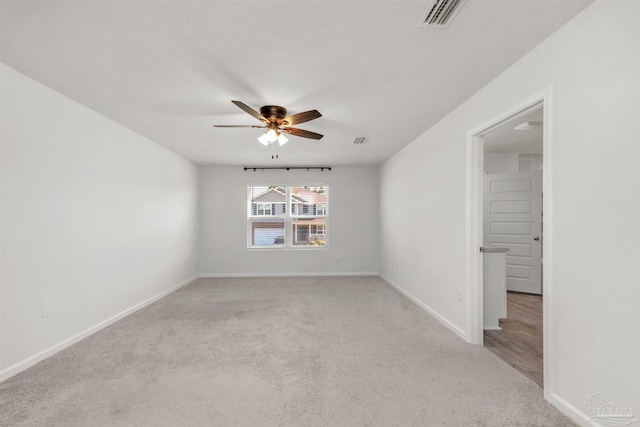 5457 Merlin Way, Milton, FL 32583 - unfurnished room featuring a ceiling fan, light carpet, and baseboards