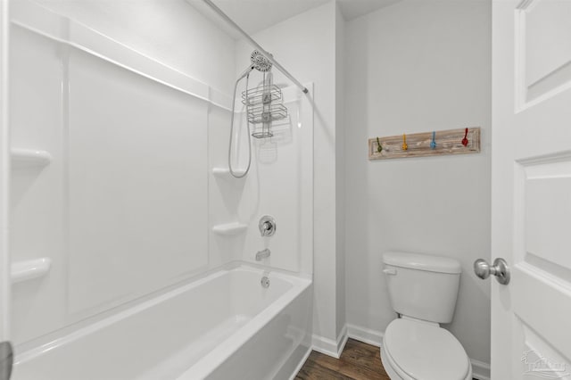 5457 Merlin Way, Milton, FL 32583 - bathroom with wood finished floors, baseboards, toilet, and tub / shower combination