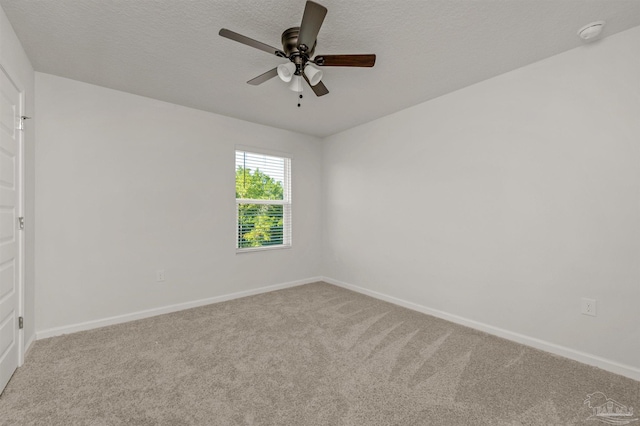 5457 Merlin Way, Milton, FL 32583 - unfurnished room featuring light colored carpet, baseboards, ceiling fan, and a smoke detector