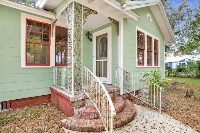 view of exterior entry featuring crawl space