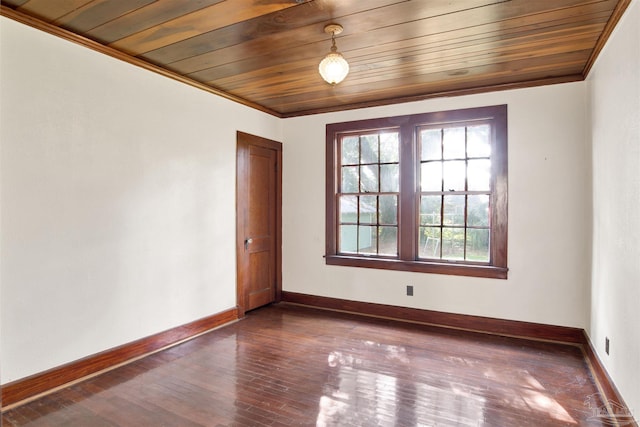 spare room featuring wooden ceiling, baseboards, ornamental molding, and dark wood-style flooring