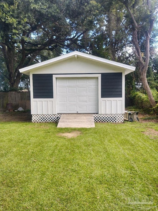 garage with a yard