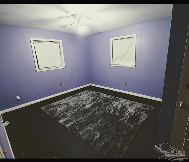 empty room featuring ceiling fan