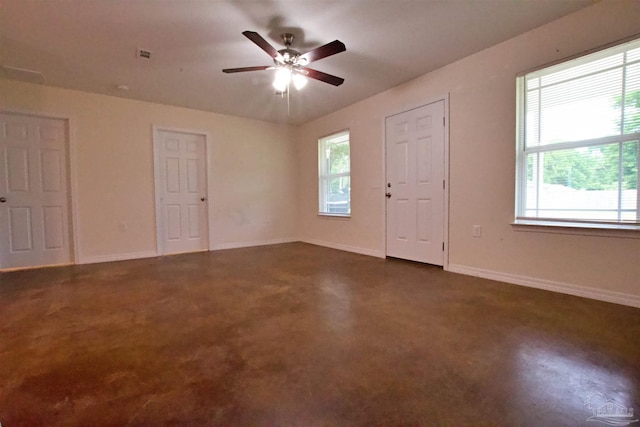 4217 Celtic Cir, Pace, FL 32571 - spare room with a ceiling fan and baseboards