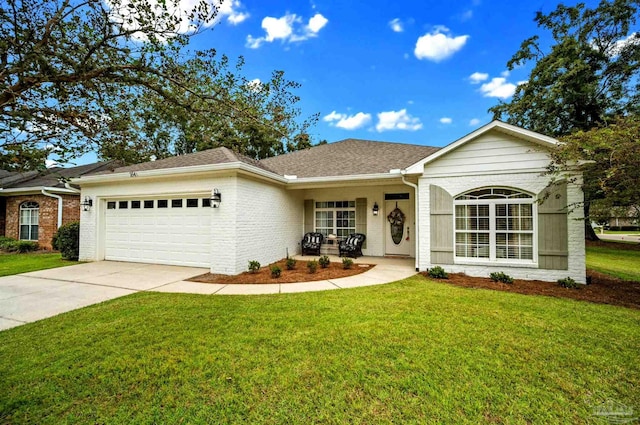 single story home featuring a front lawn and a garage