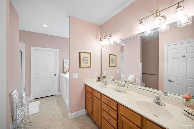 bathroom featuring tile patterned flooring, a shower with shower door, vanity, and toilet