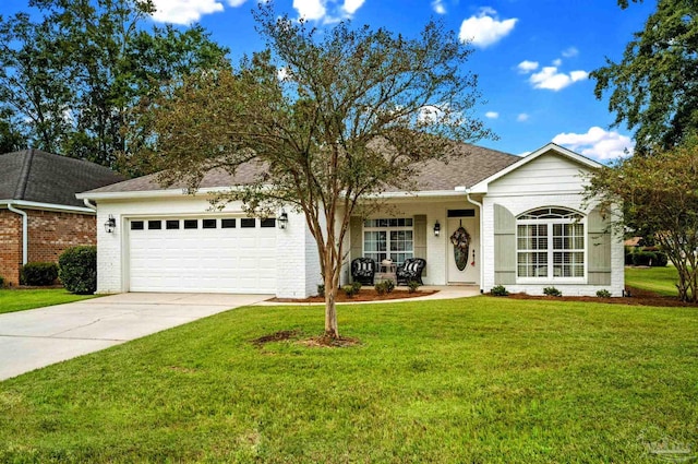 ranch-style house featuring a garage and a front yard