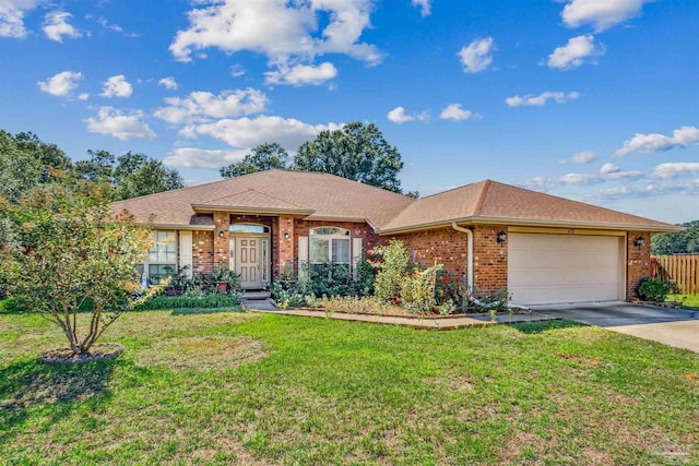 ranch-style home with a front lawn and a garage