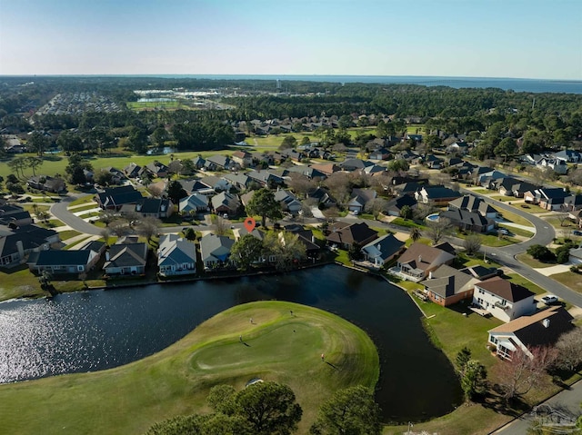 birds eye view of property featuring a residential view and a water view