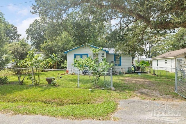 8717 Mayflower Ave, Pensacola, FL 32534 - view of front of home featuring a front lawn