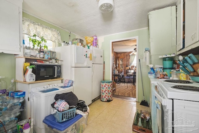 8717 Mayflower Ave, Pensacola, FL 32534 - kitchen featuring washer / dryer, white cabinetry, a textured ceiling, ornamental molding, and white appliances