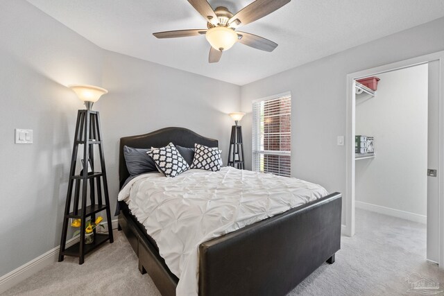 1008 Black Walnut Trl, Pensacola, FL 32514 - bedroom featuring light colored carpet, baseboards, a spacious closet, and ceiling fan