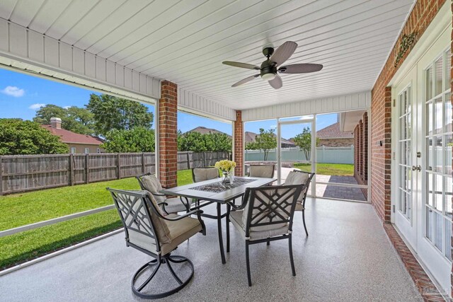1008 Black Walnut Trl, Pensacola, FL 32514 - sunroom featuring outdoor dining area, a ceiling fan, and french doors