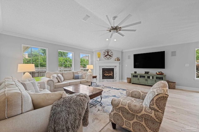 1008 Black Walnut Trl, Pensacola, FL 32514 - living area featuring a ceiling fan, light wood-style floors, crown molding, a textured ceiling, and baseboards