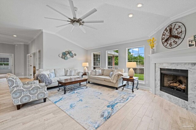 1008 Black Walnut Trl, Pensacola, FL 32514 - living room featuring crown molding, wood finished floors, a textured ceiling, vaulted ceiling, and a ceiling fan