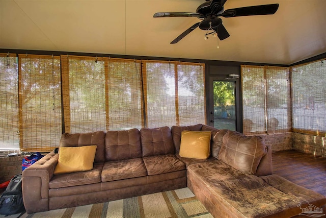 sunroom featuring ceiling fan