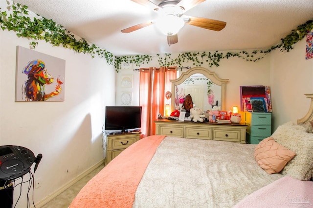 bedroom with light colored carpet and ceiling fan