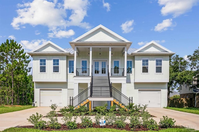 view of front facade with a porch and a garage