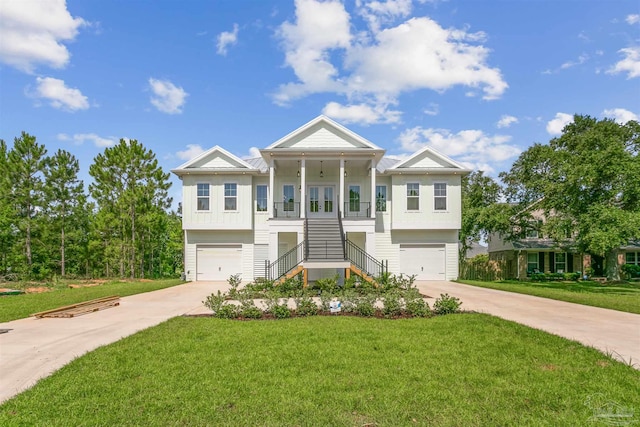 view of front of home featuring a front lawn and a garage