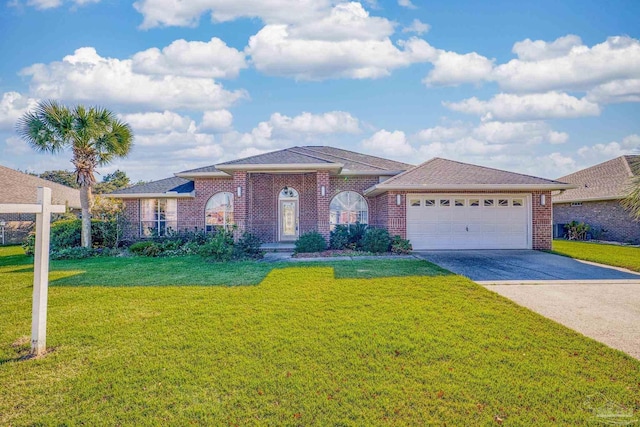 single story home with a garage and a front lawn