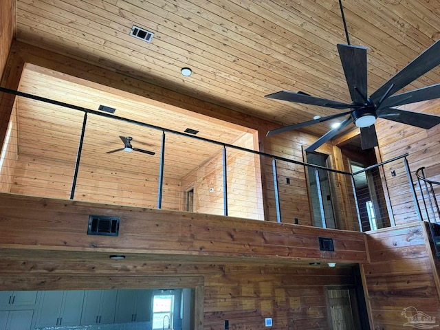 interior details with wood walls and wooden ceiling