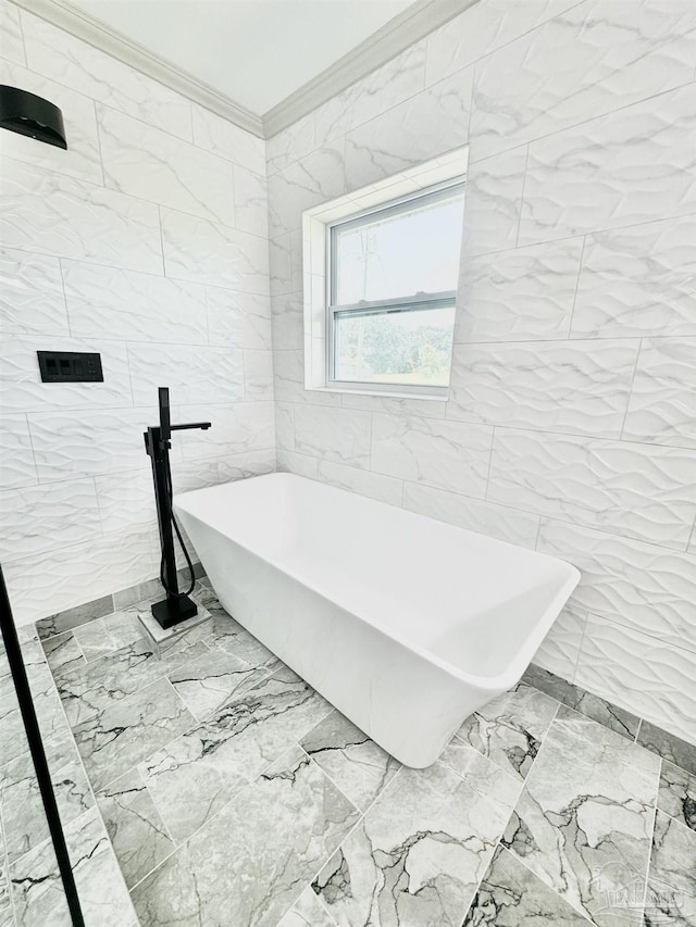 bathroom featuring a washtub, ornamental molding, and tile walls