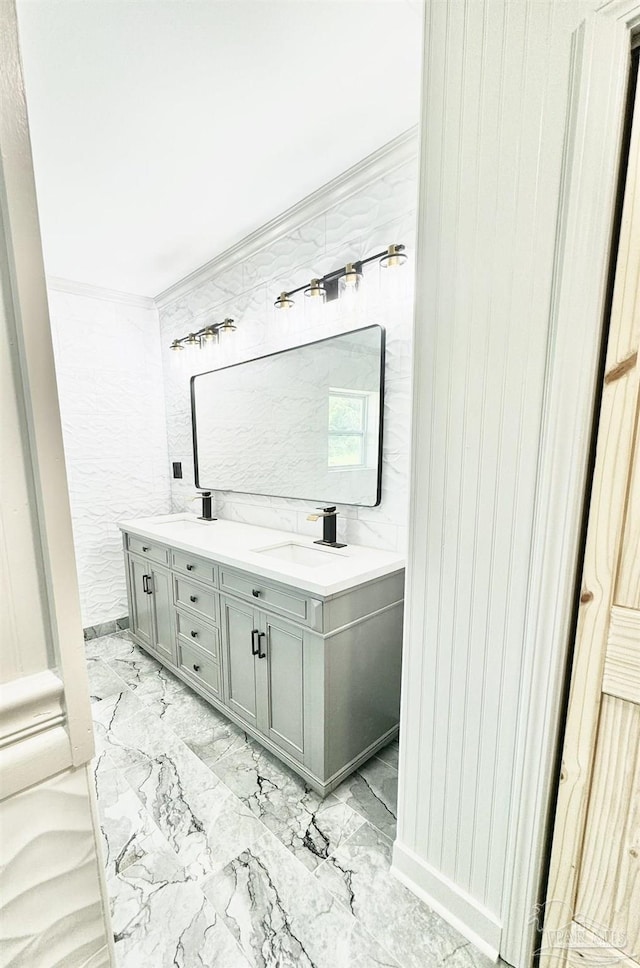 bathroom featuring vanity and crown molding