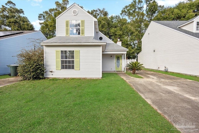 view of front of house with a front lawn