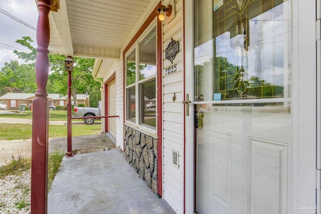 7035 Moore Ave, Pensacola, FL 32526 - view of exterior entry featuring covered porch