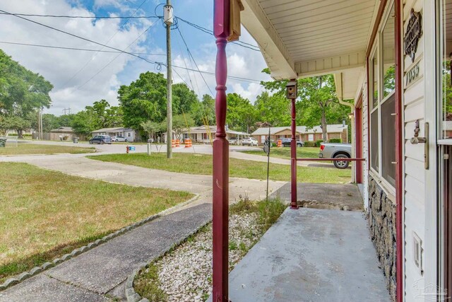 7035 Moore Ave, Pensacola, FL 32526 - view of patio featuring a porch