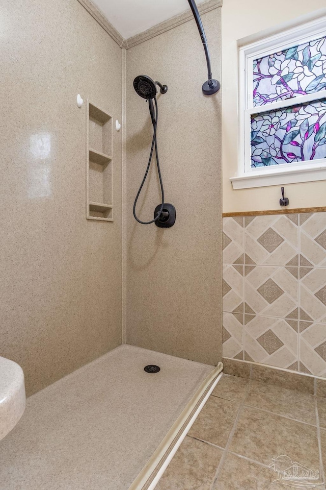 7035 Moore Ave, Pensacola, FL 32526 - full bathroom featuring tiled shower and tile patterned flooring