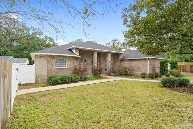 view of front of home with a front yard