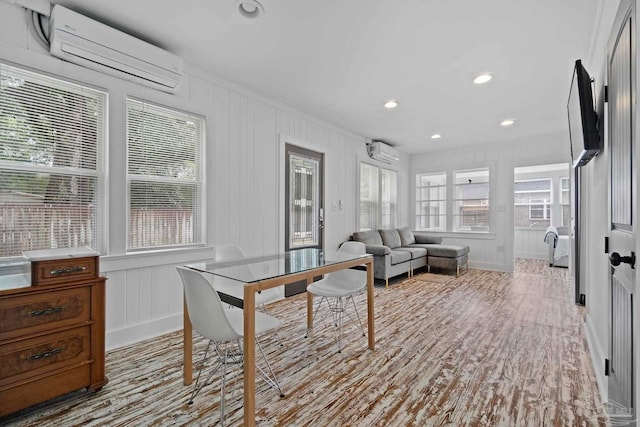 living room with a wall unit AC