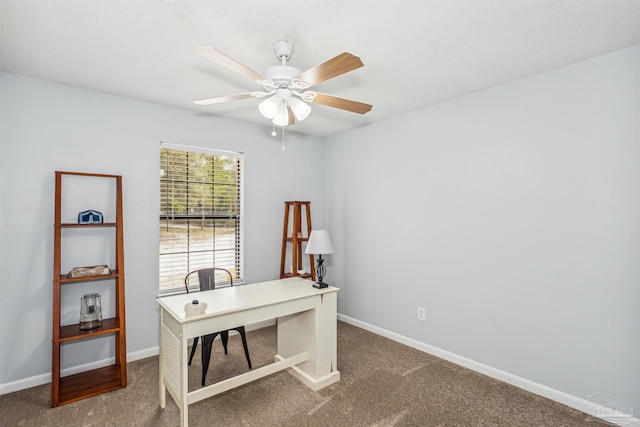 home office featuring carpet flooring and ceiling fan