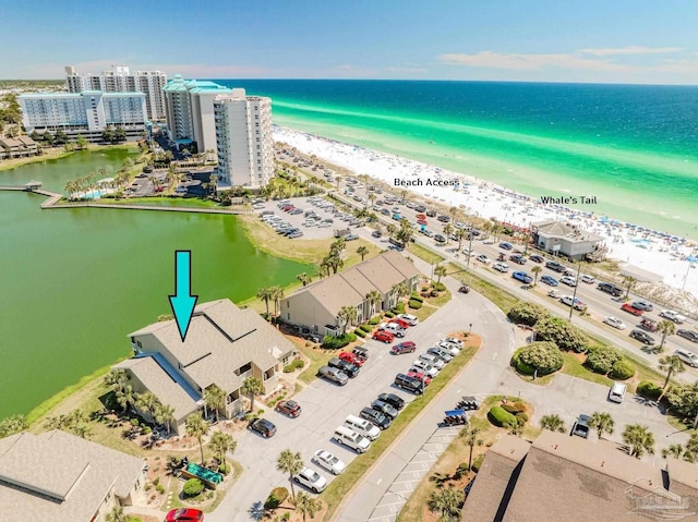 aerial view with a view of the beach and a water view