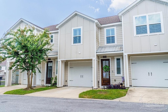 multi unit property featuring a garage