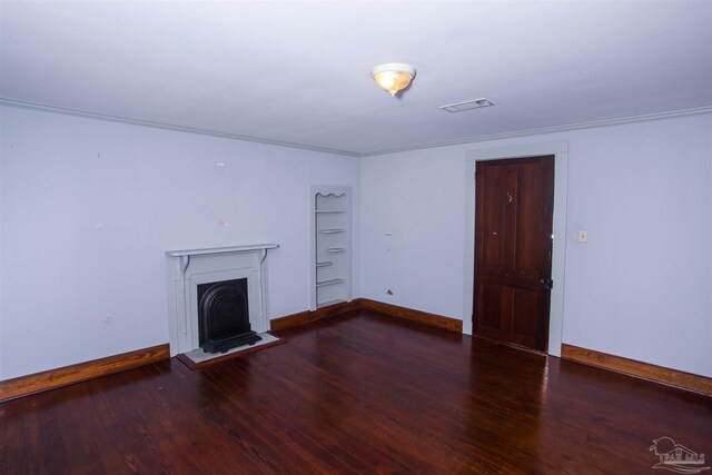 unfurnished living room with dark hardwood / wood-style floors