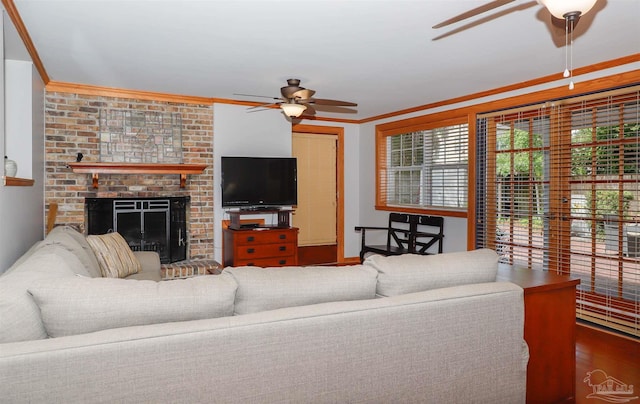 1609 N Spring St, Pensacola, FL 32501 - living room with a ceiling fan, ornamental molding, a brick fireplace, and wood finished floors