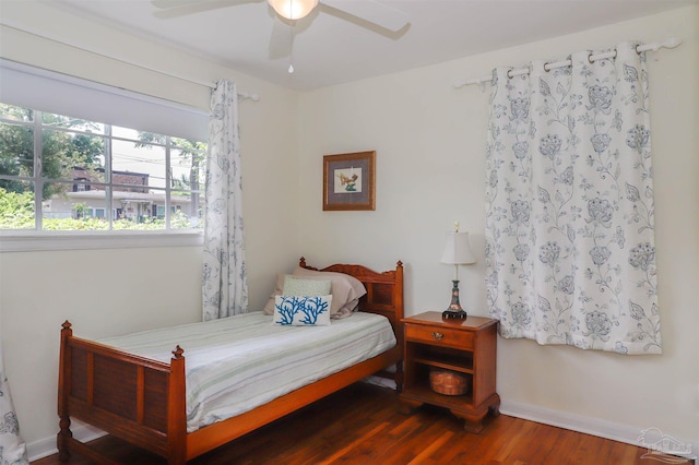 1609 N Spring St, Pensacola, FL 32501 - bedroom featuring wood finished floors, ceiling fan, and baseboards