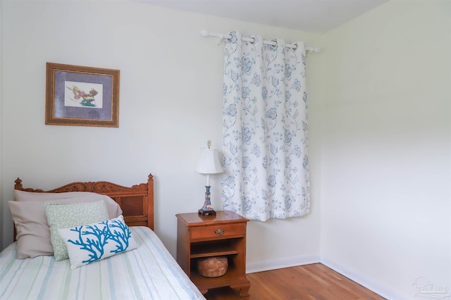 1609 N Spring St, Pensacola, FL 32501 - bedroom with wood finished floors and baseboards
