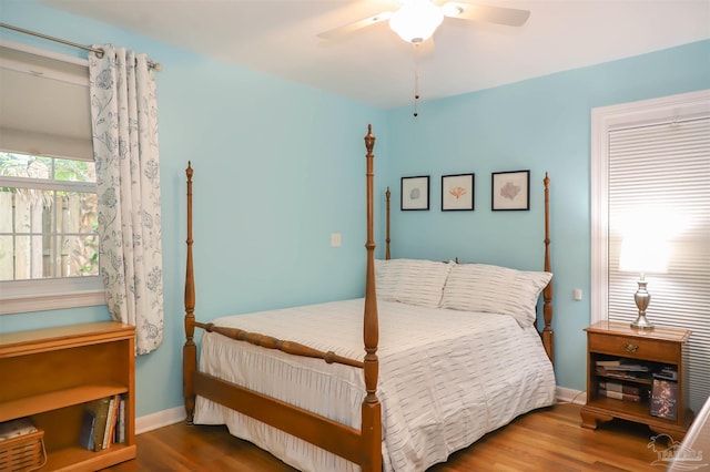 1609 N Spring St, Pensacola, FL 32501 - bedroom featuring wood finished floors, baseboards, and a ceiling fan
