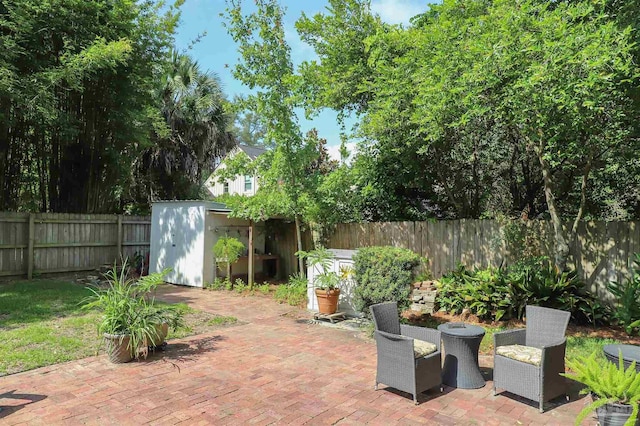 1609 N Spring St, Pensacola, FL 32501 - fenced backyard featuring a patio area
