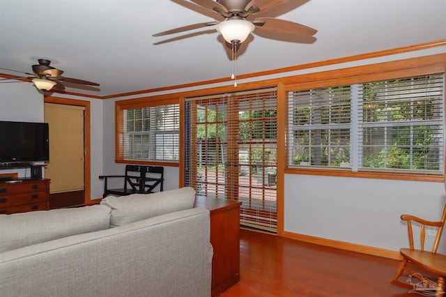 1609 N Spring St, Pensacola, FL 32501 - living area with ceiling fan, wood finished floors, baseboards, and crown molding