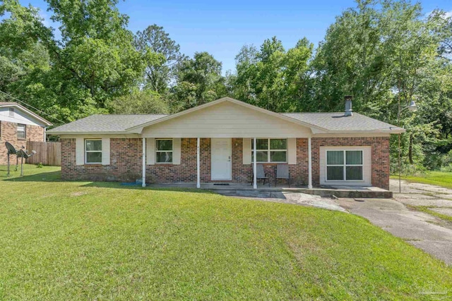 401 Ronda St, Pensacola, FL 32534 - ranch-style home featuring brick siding, a porch, and a shingled roof