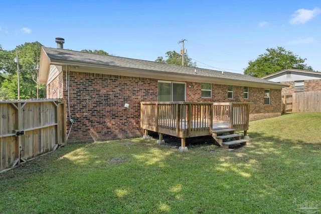 401 Ronda St, Pensacola, FL 32534 - rear view of house with brick siding, a deck, and a shingled roof