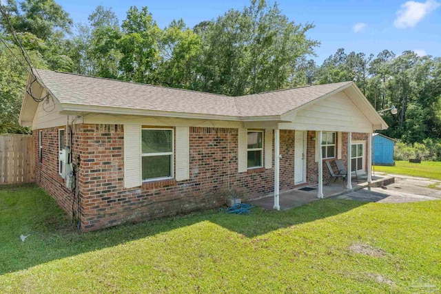 401 Ronda St, Pensacola, FL 32534 - ranch-style home featuring brick siding and a shingled roof