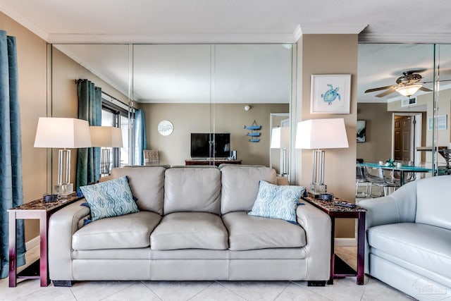 13817 Perdido Key Dr Unit 703, Pensacola, FL 32507 - living room with crown molding, light tile patterned flooring, and ceiling fan